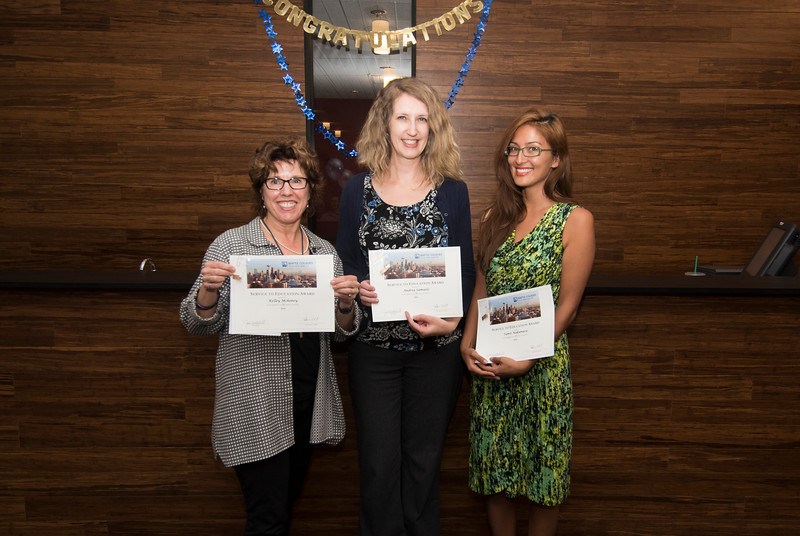 Kelley McHenry, Gina Nakamura, and Andrea Samuels receive awards