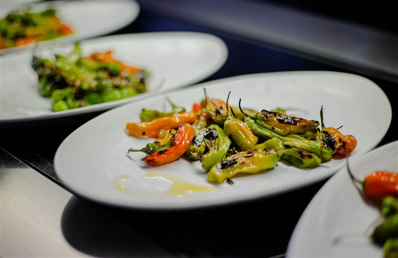 Fire roasted peppers served at Community Dinner