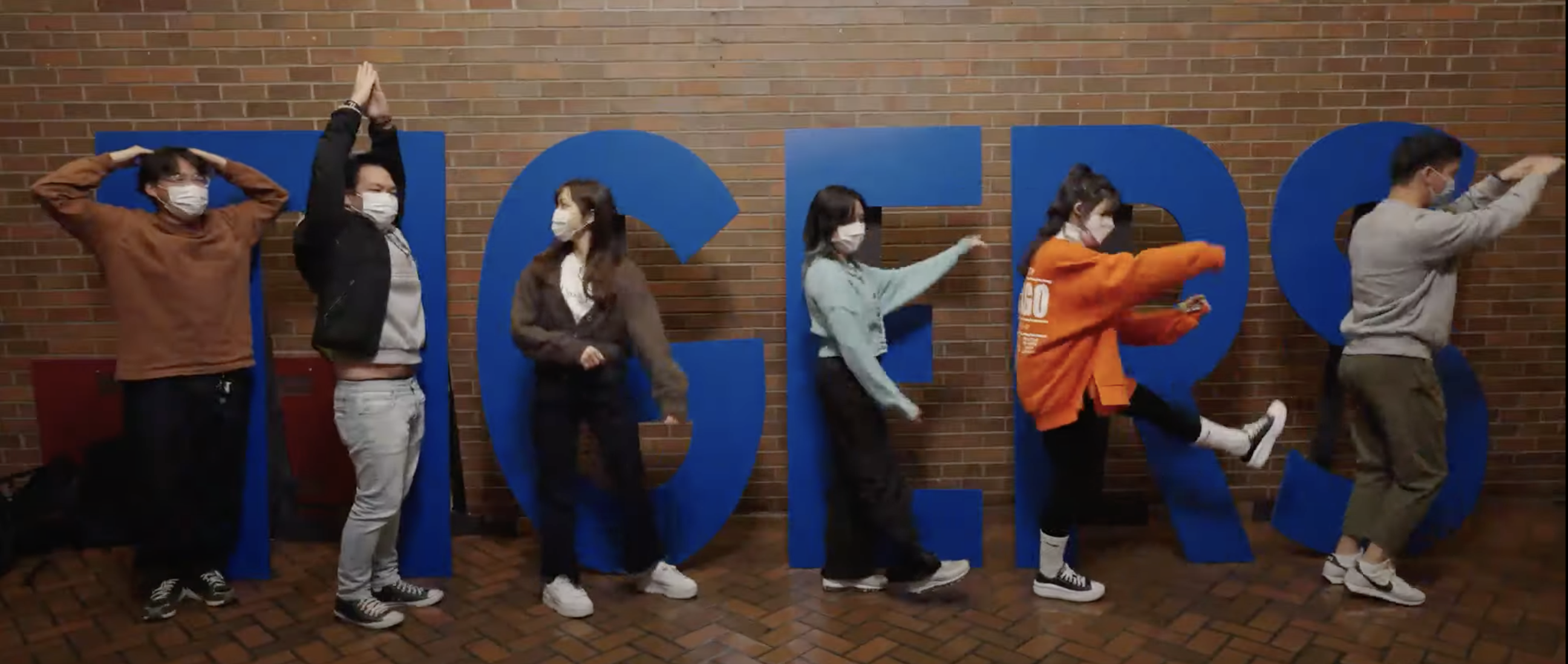 students pose with the TIGER letters at SCC