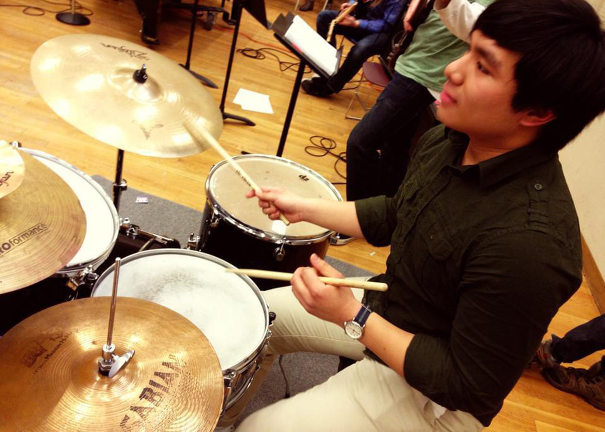 Josh Valdez playing on a drum set