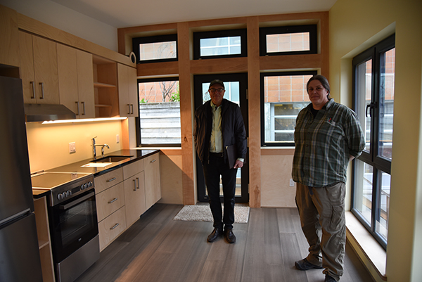 Catie Chaplan and Joe Giampietro show off the Mini Zeph house kitchen